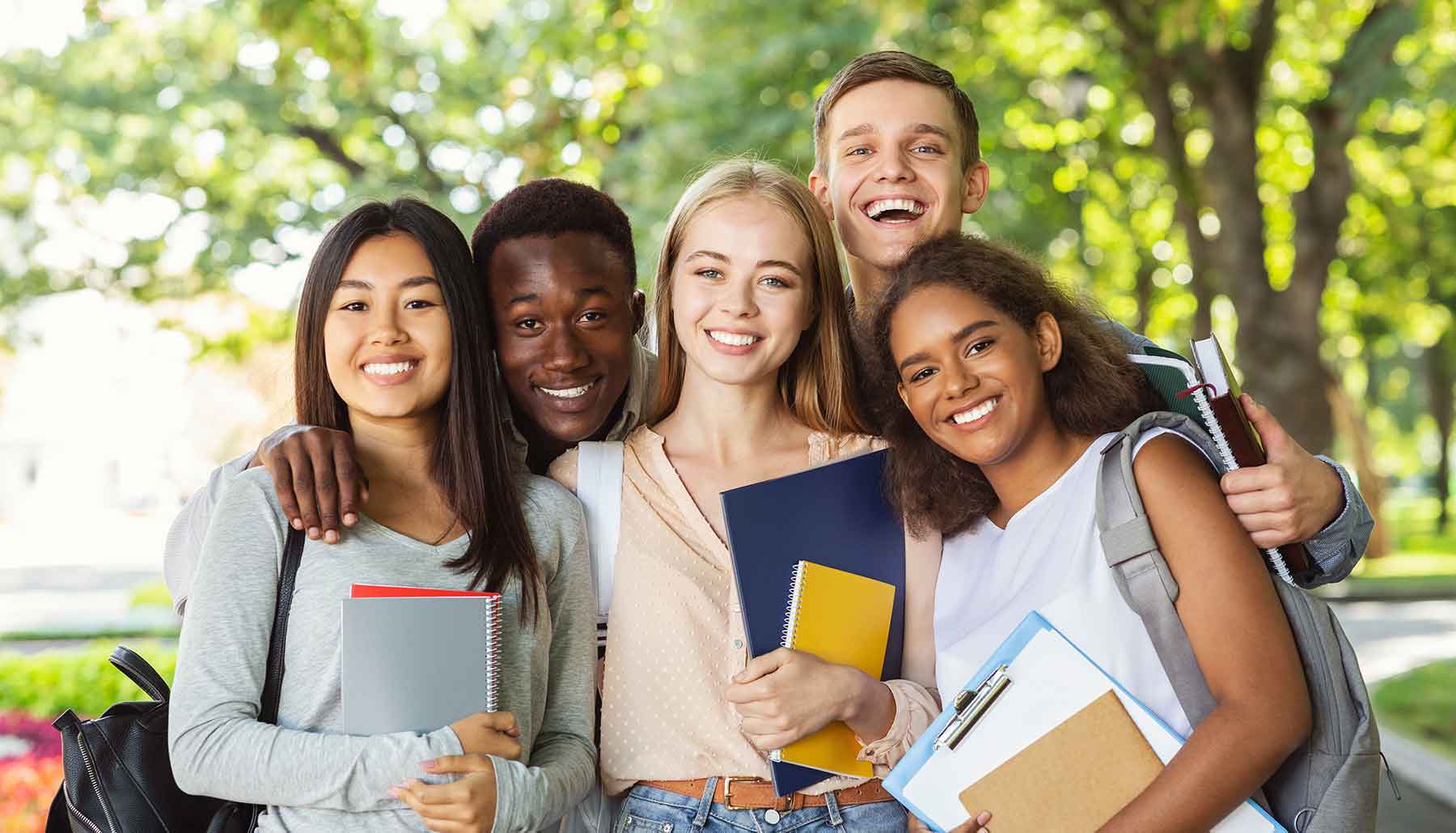 Diverse group of happy college students